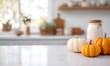 © simba kim - Pumpkins and a kitchen counter on a blurred background