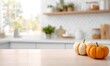 © simba kim - Pumpkins and a kitchen counter on a blurred background