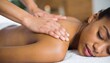 © luzaein - Relaxing Spa Treatment A Woman Receiving a Back Massage for Wellness and Serenity