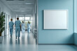 © Martinesku - Blank empty white picture frame mockup in a hospital corridor with blurred medical personnel while walking