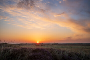 Wall Mural - sunrise with glowing clouds