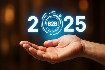 Wall Mural - futuristic b2b business concept for 2025 with glowing light elements over hand on dark background, s