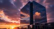 © 5gFx - Modern skyscraper reflecting a dramatic sunset