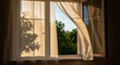 © miftakhul - Open window with sheer curtains sunlight and tree shadows creating a peaceful indoor scene