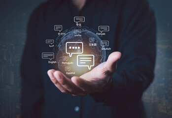 Innovative concept of global communication with multiple languages and speech bubbles in a business hand, symbolizing translation, networking, and international connection.