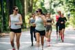 © standret - Activity, healthcare conception. Group of runners are together outdoors