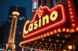 Brightly lit casino sign glows at night, symbolizing gambling, entertainment, and nightlife in a bustling city. Neon lights create excitement and allure for players seeking fortune and fun.