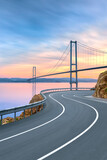 Road landscape at sunset on the beach. View of big highway bridge in summer. highway landscape at colorful sunset. Turkey journey in coastal road. Bosphorus bridge, istanbul, Turkey