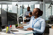 © DC Studio - Trader in brokerage firm office analyzing market metrics and executing trades using trading app panel on PC. African american woman working in prop firm monitoring stock exchange