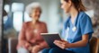 © SKIMP Art - A female doctor is using a tablet while sitting with a patient in a clinic The focus is blurred to emphasize the interaction between the healthcare professional and the elderly female Generative AI