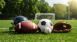 © Ahmad - Diverse Sports Gear on a Lush Field: An assortment of sports equipment, including a football, soccer ball, baseball, baseball glove, and helmet, rests on a vibrant green field, ready for action.