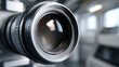 © SashaMagic - Close-up of a camera lens with blurred background.