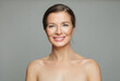 © millaf (Nemchinova) - Glorious mid aged mature woman looking at camera and smiling. Healthy face skin care beauty