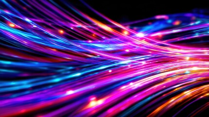 Wall Mural - vibrant light trails in a dark background, showcasing movement and energy, perfect for tech themes