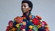 © NovaVision - A stunning portrait features a woman showcasing a handmade crochet floral jacket in a studio setting.