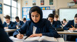 © Rsquare stock - Muslim girl studying in classroom, focused student learning with education and diversity concept