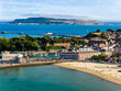 Sunny summer afternoon at the seaside resort town of Weymouth in Dorset, England.