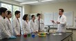 © fabrian - Students in a science lab learning from a professor