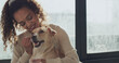© peopleimages.com - Happy woman, dog or hug with love for animal care, adoption or best friend at indoor shelter. Female person, customer or adopt with pet or embrace for canine welfare, trust or support in doggy center