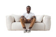 © SunCamCo - Front view of a man sitting on a box cushion sofa wearing a polo shirt, chinos, and slip-on shoes, smiling isolated on a white transparent background