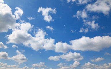 Wall Mural - a beautiful blue sky with soft, white clouds, for an abstract background