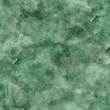 A luxurious and serene green marble texture with delicate white veining, creating a rich and elegant abstract background for sophisticated interior design projects.