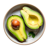 Sliced avocado in ceramic bowl, vibrant colors, healthy eating concept, Isolated background