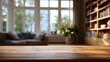 © Sirsak - Wooden table in front of a blurred living room with large windows