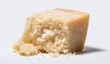 © Wendi - Close-up of a wedge of hard cheese, with a broken, crumbly edge. The cheese is a pale yellow-beige, and fine salt crystals are visible on its surface