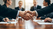 © Lunatic - Handshake of agreement and collaboration in a business meeting setting