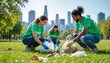 © Mediaphotos - Group of young adult multiethnic volunteers cleaning park, collecting litter and sorting trash into bags, wearing gloves, crouching on grass with city skyline in background