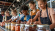 © buraratn - Young individuals engaged in cooking class, focused on preparing ingredients in jars. atmosphere is lively and collaborative, showcasing teamwork and creativity in modern kitchen setting