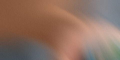 Wall Mural - a blurred abstract background with a grainy texture features a blend of brown, pink, and blue hues i