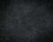 © Dari - Dark, textured background with subtle variations in shading and a mottled appearance