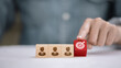 © จุฑารัตน์ เจริญวงษ์ - Target customer concept with wooden blocks and red goal icon