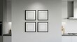 © ALLmost - Four square frames with white mats hang on a gray wall in a modern kitchen setting, illuminated by overhead lighting.