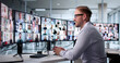 © Andrey Popov - Virtual Business Conference: Young Manager Attending Online Meeting Via