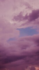 Wall Mural - Sunny Cloudscape. Sunset Time Lapse Time-lapse In Red Yellow Orange Blue Colors. Sunrays In Dramatic Sky. Bold Sunset Sky Natural Background. Saturated Colors Of Twilight Sunset Sky Sunrays Clouds