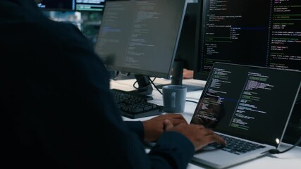 Software Developer working on laptop computer write code, Ai Prompt Software development Application in office. Professional Computer Programmer typing on keyboard with code on monitor screen