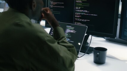 Professional Black Software developer and Computer Programmer Typing on keyboard and Using Desktop computer, writing code, Development Software Application, Cyber Security Programming in tech Office.
