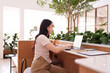 © snowing12 - Asian adult woman productive remote work cafe digital nomad lifestyle online business computer laptop internet happy professional freelance independent entrepreneur concept