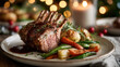 © Nasim Reza - Gourmet rack of lamb dinner with roasted vegetables and festive lights