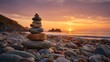 © MACHATOMI - Majestic stack of stones on rocky beach, warm sun setting over the horizon, sky bursting with orange and purple tones.