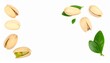 © Hadjnaas - Pistachio nuts with leaves isolated on white background