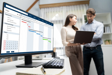 Wall Mural - project planning software for brisk business project management on the computer screen showing timel