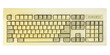 © lial88 - Vintage computer keyboard from the 1990s isolated on white background.