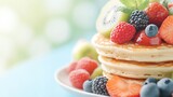 Pancakes, eggs, and fruit—a close-up of a perfectly delicious breakfast. 