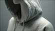 © Yusuf - Close-up of a heather gray hooded sweatshirt on a mannequin, showcasing the fabric texture and drawstring hood. The image is minimalist with a neutral gray background