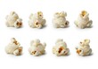 © UniqueStore - Eight fluffy white popcorn kernels arranged in two rows on white snack food