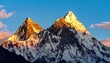 © donny - Two majestic snow-capped mountain peaks illuminated by the golden light of sunrise or sunset.